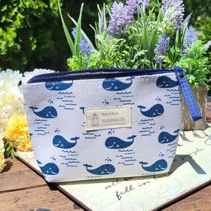 Cute, whale print cosmetic bag. Zippered closure, expandable bottom  New!